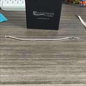 Inspiransa Silver Faith Bracelet Firm on price